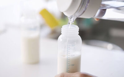 What temperatures do proteins in breast milk begin to break down?