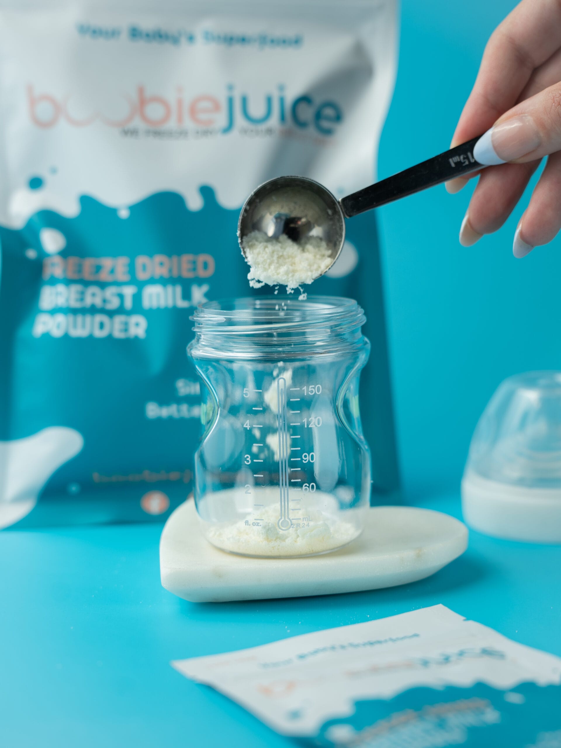BoobieJuice Fortifying Breast Milk Powder Fortifying a baby bottle with breast milk powder